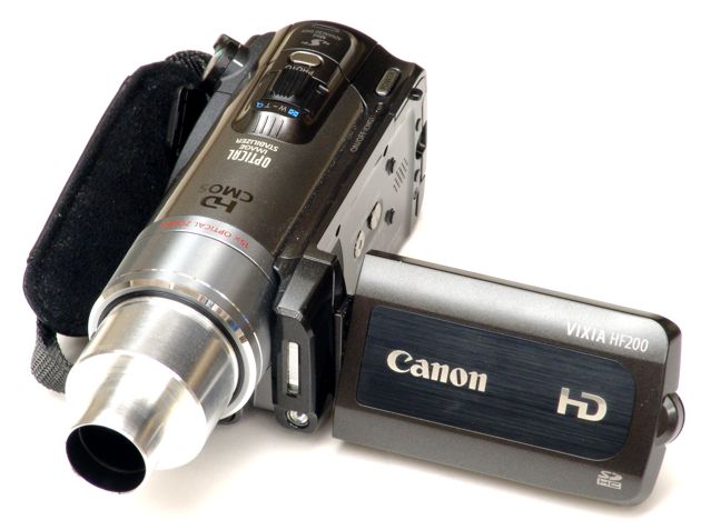 Canon HF200 video camera with 23mm eyetube adapter attached