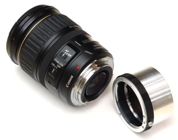 EF mount to M42x1 adapter next to Canon EF 28-135mm F/3.5-5.6 IS USM lens