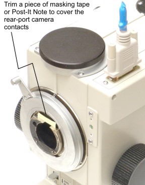 Covering the Topcon TRC-50VT rear-port camera contacts for use with digital camera